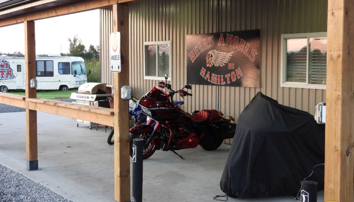 Hells Angels and Red Devils motorcycle gang members arrested over connection to robbery in Hamilton